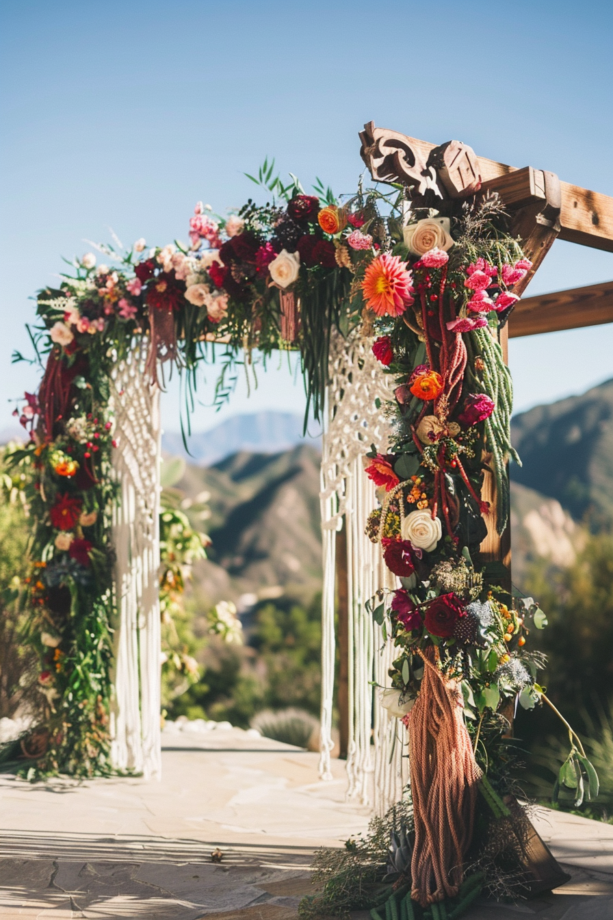 Boho-designed wedding. Macrame backdrop under wildflower adorned arch.