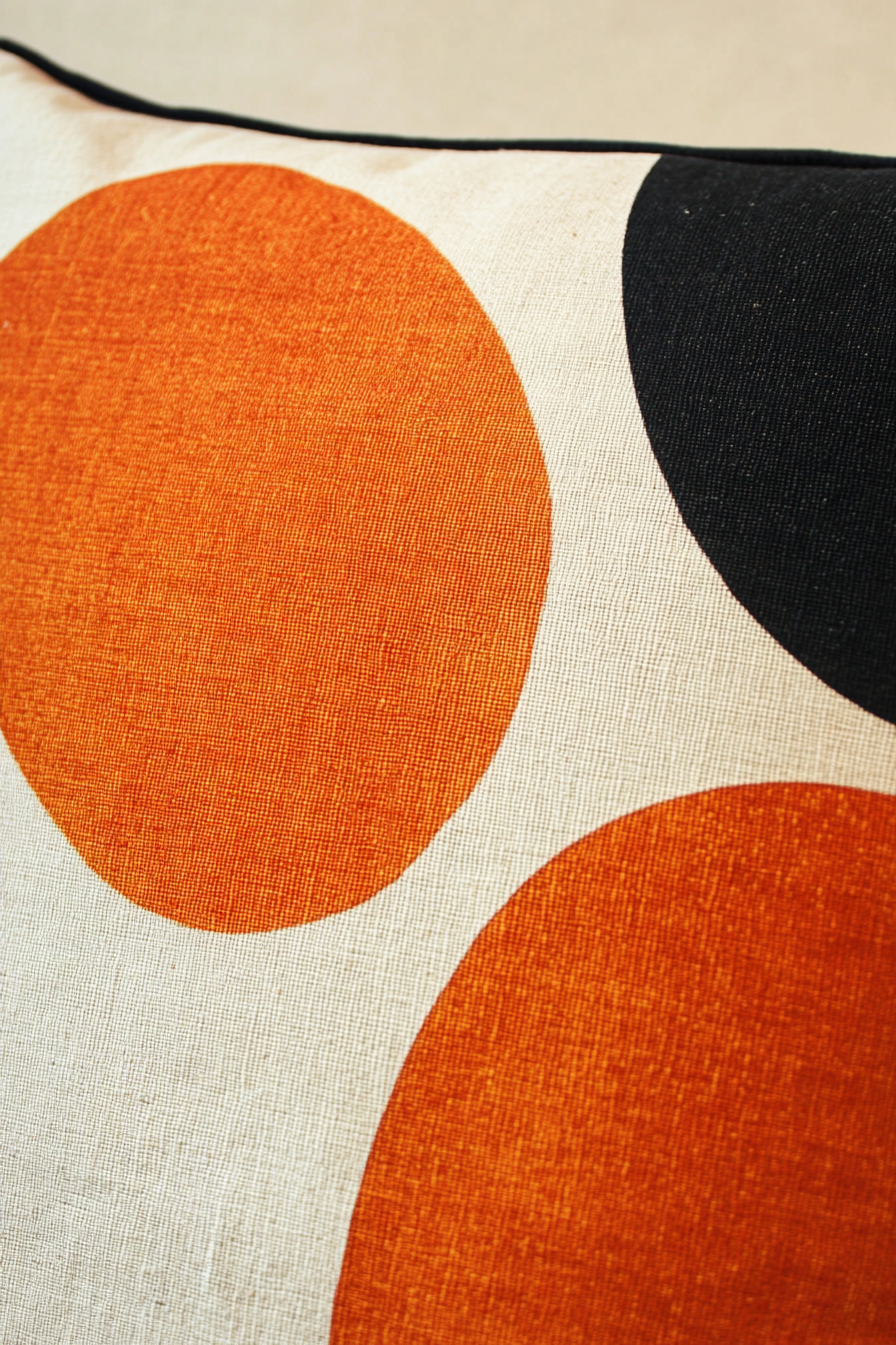 Fall RV decor. Bauhaus-inspired orange geometric cushion covers.